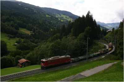 Ge 6/6 II - 704 mit einem Güterzug 
